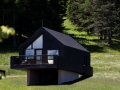 Hotel Pfoesl_Aussenansicht Waldchalets c Florian Andergassen 2