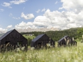 Hotel Pfoesl_Aussenansicht Waldchalets c Florian Andergassen