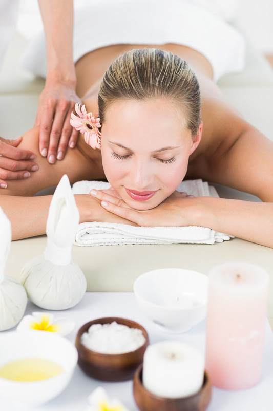 Pretty blonde enjoying a massage