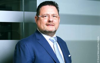 Neumann wird CEO der Grand Metropolitan Hotels